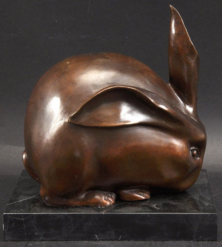 After Francois Pompon An Art Deco Style Bronze Rabbit.: AFTER FRANCOIS POMPON AN ART DECO STYLE BRONZE RABBIT. 8.5ins wide.