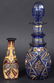 A SMALL BOHEMIAN BLUE AND GILT DECANTER AND STOPPER tog