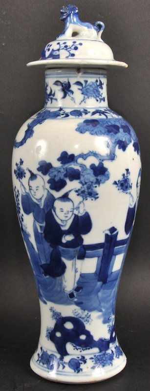 A 19TH CENTURY CHINESE BLUE AND WHITE BALUSTER VASE AND: A 19TH CENTURY CHINESE BLUE AND WHITE BALUSTER VASE AND COVER painted with figures. Chip and hairline. 12.75ins high.