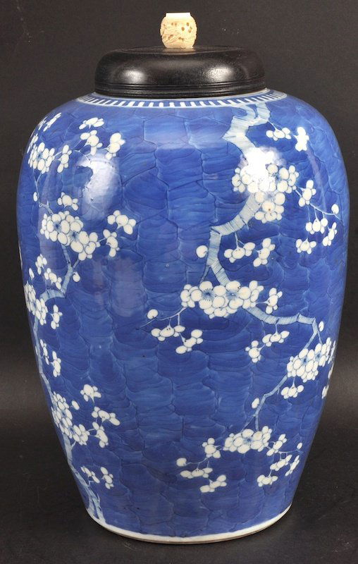 A 19TH CENTURY CHINESE BLUE AND WHITE BALUSTER GINGER: A 19TH CENTURY CHINESE BLUE AND WHITE BALUSTER GINGER JAR painted with flowering trees. Good condition. Jar 12ins high.