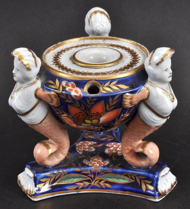 AN EARLY 19TH CENTURY MILES MASON IRONSTONE INKWELL: AN EARLY 19TH CENTURY MILES MASON IRONSTONE INKWELL with caryatid mounts. 4.5ins wide.
