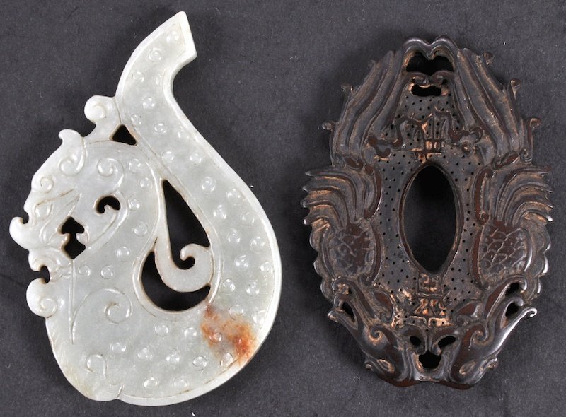 A CHINESE GREEN JADE S DRAGON together with a carved: A CHINESE GREEN JADE S DRAGON together with a carved wood amulet. Good condition. (2)