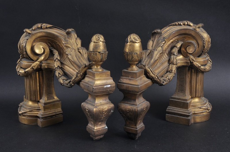 A GOOD PAIR OF LOUIS XVITH ORMOLU CHENETS with acorn: A GOOD PAIR OF LOUIS XVITH ORMOLU CHENETS with acorn finials, acanthus leaves and garlands. 11ins long.