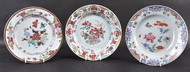 A GROUP OF THREE 18TH CENTURY CHINESE EXPORT CIRCULAR P: A GROUP OF THREE 18TH CENTURY CHINESE EXPORT CIRCULAR PLATES Qianlong, of various designs. Rim fritting, one with glaze flaw. 9ins diameter. (3)