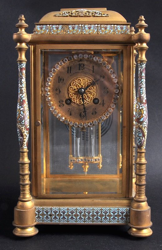 A GOOD 19TH CENTURY FRENCH BRASS AND CHAMPLEVE ENAMEL F: A GOOD 19TH CENTURY FRENCH BRASS AND CHAMPLEVE ENAMEL FOUR GLASS CLOCK, the French circular movement retailed by BAILEY, BANKS & BIDDLE CO., PHILADELPHIA, surrounded by brilliants, striking on a gong,
