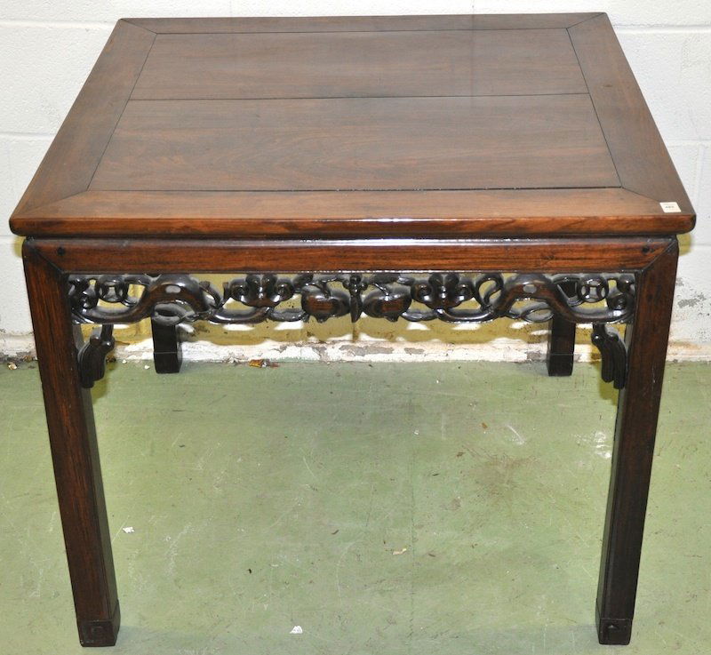 A LOVELY CHINESE CARVED HARDWOOD TABLE of square form,: A LOVELY CHINESE CARVED HARDWOOD TABLE of square form, with carved frieze.