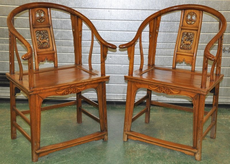 A PAIR OF 19TH CENTURY CHINESE CARVED ELM OFFICIALS: A PAIR OF 19TH CENTURY CHINESE CARVED ELM OFFICIALS CHAIRS the splats carved with bats and motifs. 2ft x 3ft 3ins.