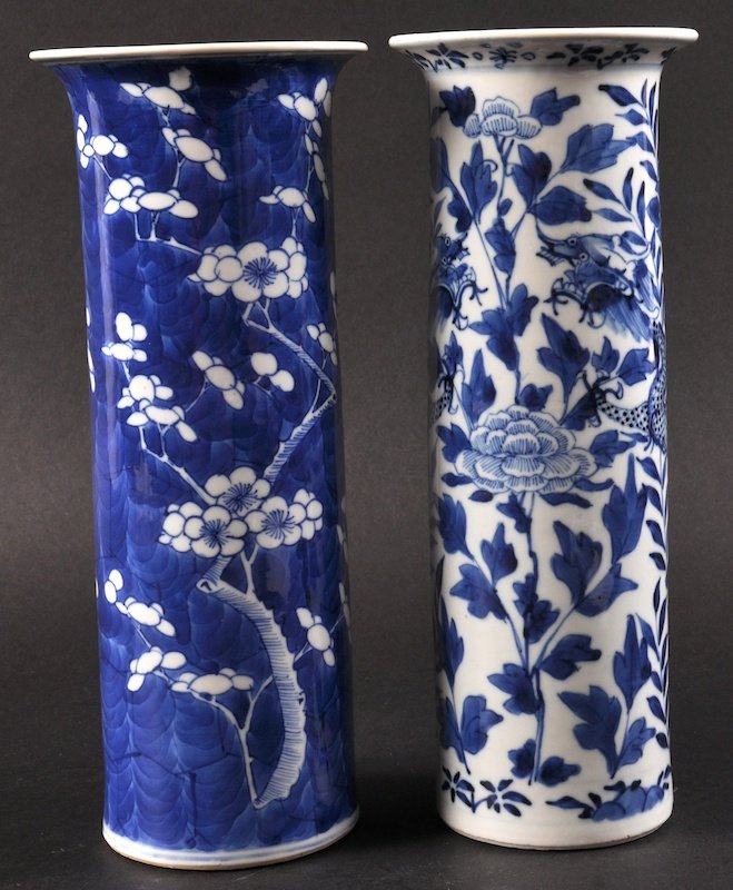 A 19TH CENTURY CHINESE BLUE AND WHITE SLEEVE VASE: A 19TH CENTURY CHINESE BLUE AND WHITE SLEEVE VASE together with another. Good condition. 10.25ins high. (2)