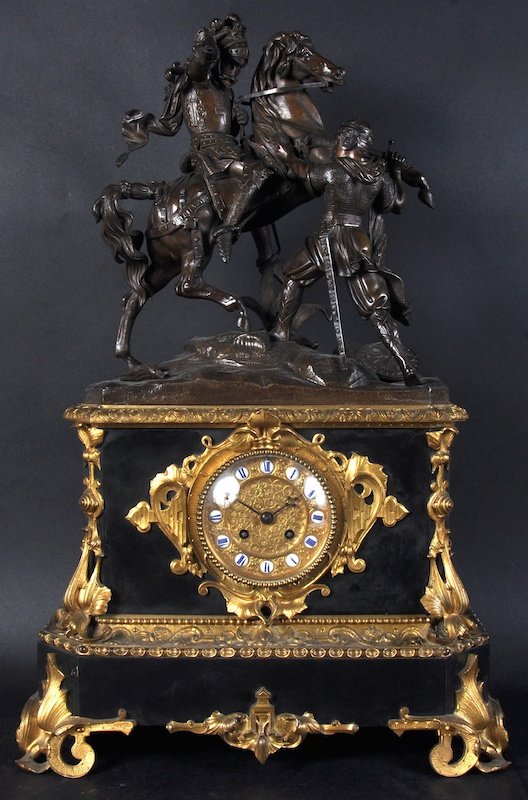 A 19TH CENTURY MARBLE, BRONZE AND ORMOLU CLOCK by MARC: A 19TH CENTURY MARBLE, BRONZE AND ORMOLU CLOCK by MARC A PARIS, surmounted by a bronze group of warriors fighting. 25 inches high.