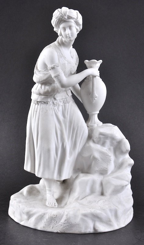 A 19TH CENTURY MINTON BISCUIT FIGURE OF AN EASTERN: A 19TH CENTURY MINTON BISCUIT FIGURE OF AN EASTERN WATER CARRIER.