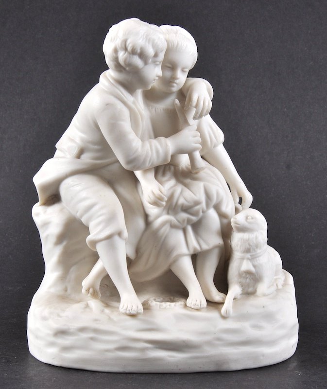 A 19TH CENTURY ENGLISH PARIAN GROUP BOY AND GIRL with: A 19TH CENTURY ENGLISH PARIAN GROUP BOY AND GIRL with lamb.