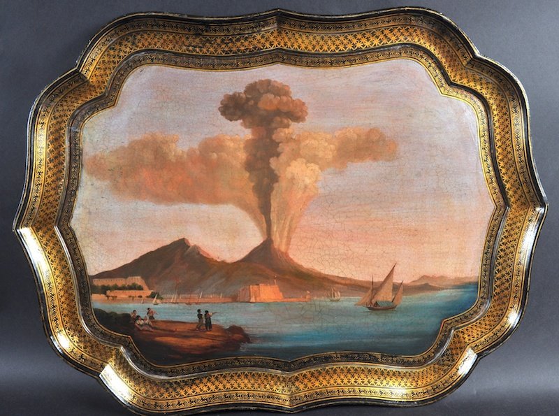 A SUPERB VICTORIAN JENNINGS & BETTRIDGE PAPIER MACHE: A SUPERB VICTORIAN JENNINGS & BETTRIDGE PAPIER MACHE SHAPED TRAY with shaped edge decorated in gilt, the centre with a scene of Vesuvius erupting. Makers to the Queen. 28ins long.
