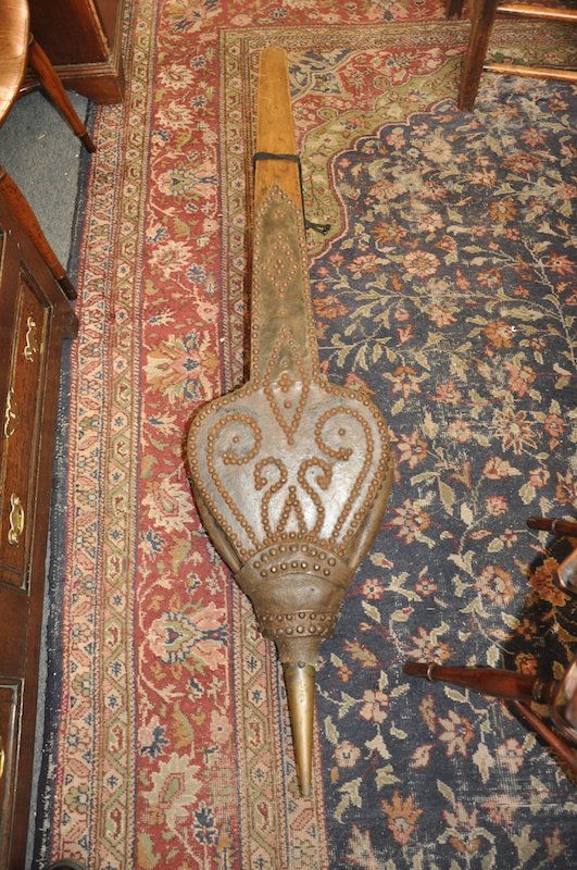 A LARGE PAIR OF WOODEN AND BRASS STUDDED LEATHER: A LARGE PAIR OF WOODEN AND BRASS STUDDED LEATHER BELLOWS. 4ft 5ins long.