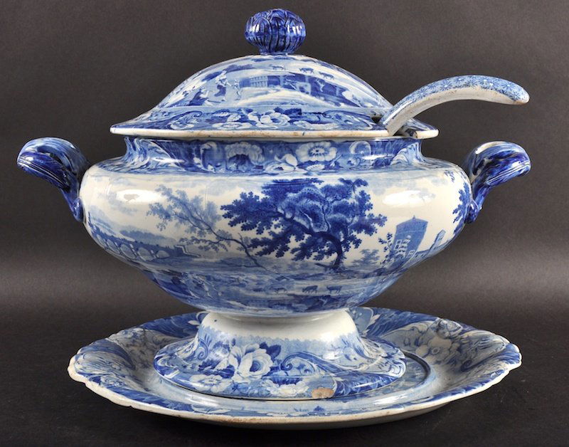 A BLUE AND WHITE OVAL TWO HANDLED TUREEN, COVER AND