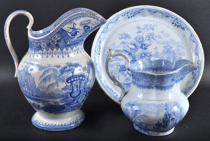 A PEKIN SKETCHES BLUE AND WHITE CIRCULAR STILTON DISH,: A PEKIN SKETCHES BLUE AND WHITE CIRCULAR STILTON DISH, 11ins diameter and TWO BLUE AND WHITE JUGS.