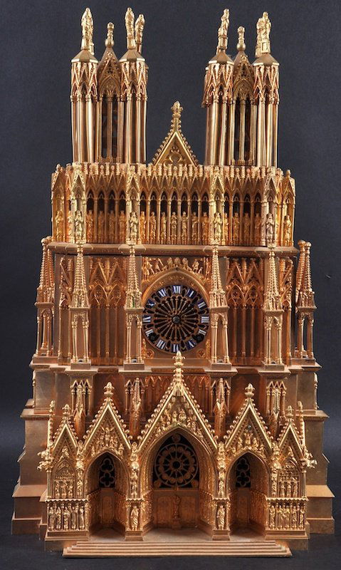 A SUPERB 19TH CENTURY FRENCH “REIMS” CATHEDRAL CLOCK by: A SUPERB 19TH CENTURY FRENCH “REIMS” CATHEDRAL CLOCK by LEROY & FILS, PARIS, No. 12125, in an ormolu case with blue and white Roman numerals striking on a single bell and stamped C.A.F. 19ins high