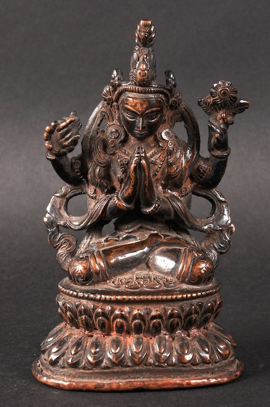 AN EARLY 20TH CENTURY SINO TIBETAN BRONZE FIGURE OF: AN EARLY 20TH CENTURY SINO TIBETAN BRONZE FIGURE OF AMITAYUS modelled upon a triangular base. Minor wear. 5. 75ins high.