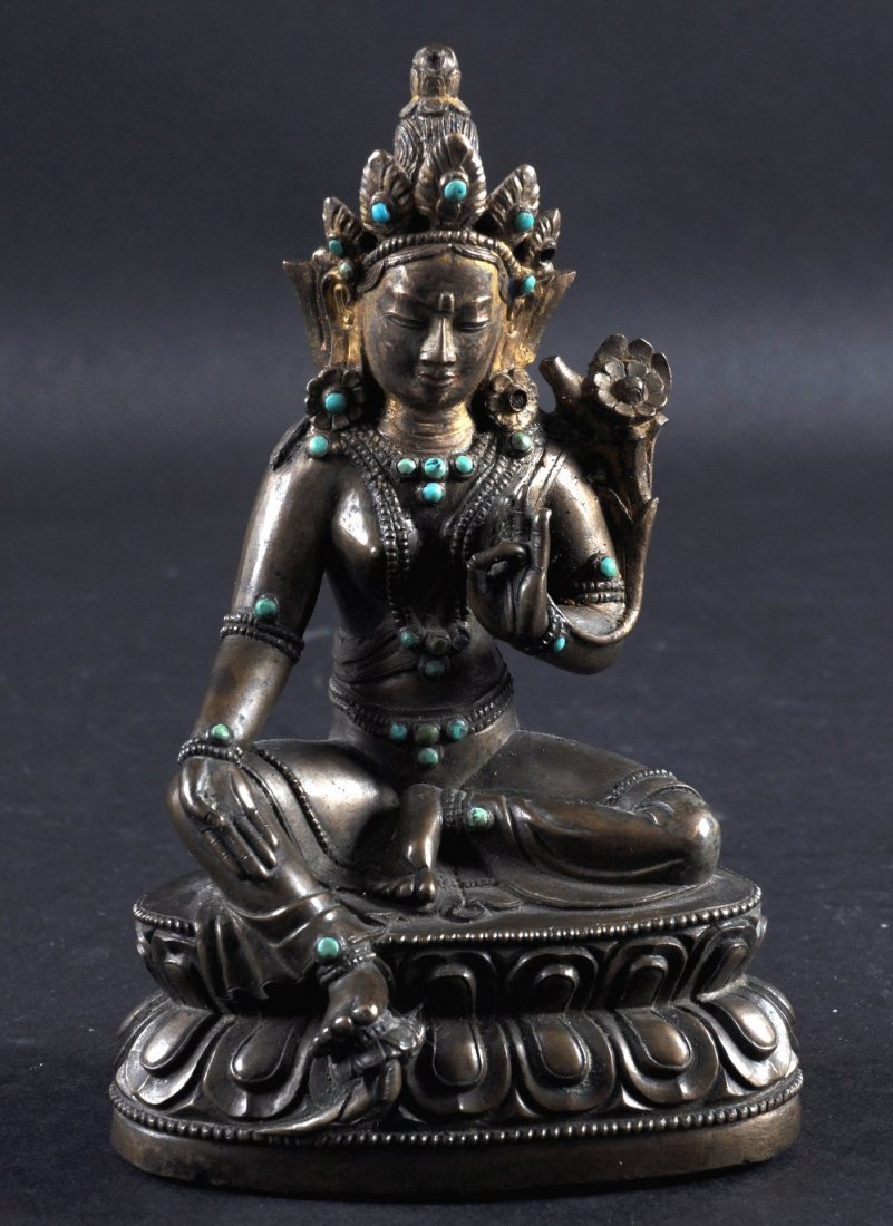 A FINE 17TH/18TH CENTURY SINO NEPALESE BRONZE FIGURE OF: A FINE 17TH/18TH CENTURY SINO NEPALESE BRONZE FIGURE OF AMITAYUS inset with turquoise beads and modelled upon a triangular lotus base. 5.75ins high.