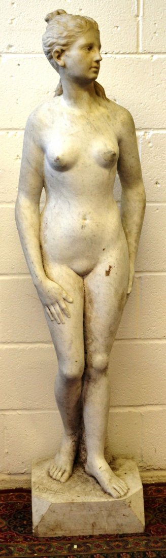 A. SPARAFONI (ITALIAN) A CARVED WHITE MARBLE STANDING: A. SPARAFONI (ITALIAN) A CARVED WHITE MARBLE STANDING NUDE. 5ft high. £1500-2000.
