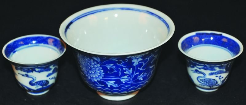 A SMALL 19TH CENTURY CHINESE BLUE & WHITE PORCELAIN: A SMALL 19TH CENTURY CHINESE BLUE & WHITE PORCELAIN BOWL, painted with a formal design of leaf-stemmed flowerheads, the base with a four-character Yongzheng mark, 4.1in diameter; together with pair of