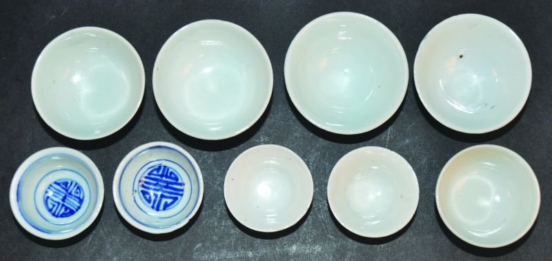NINE 19TH/20TH CENTURY CHINESE BLUE & WHITE PROVINCIAL: NINE 19TH/20TH CENTURY CHINESE BLUE & WHITE PROVINCIAL PORCELAIN TEABOWLS, the largest 2.4in diameter. (9) £30-50