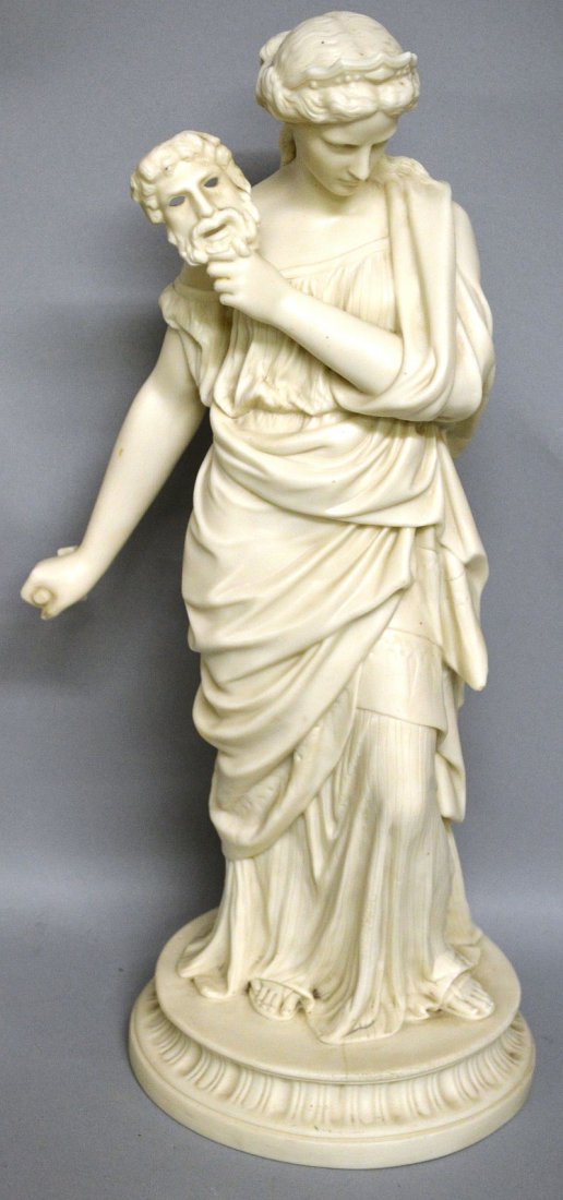 A GOOD PARIAN WARE FIGURE OF A CLASSICAL LADY holding a: A GOOD PARIAN WARE FIGURE OF A CLASSICAL LADY holding a mask and hammer on a circular base. 16.5ins high.