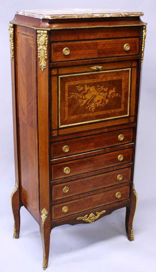 A FRENCH KINGWOOD AND ORMOLU SECRETAIRE A ABATTANT,: A FRENCH KINGWOOD AND ORMOLU SECRETAIRE A ABATTANT, with a marble top over a single drawer, a fall inlaid with musical trophies opening to reveal pigeon holes and small drawers above a further four lo