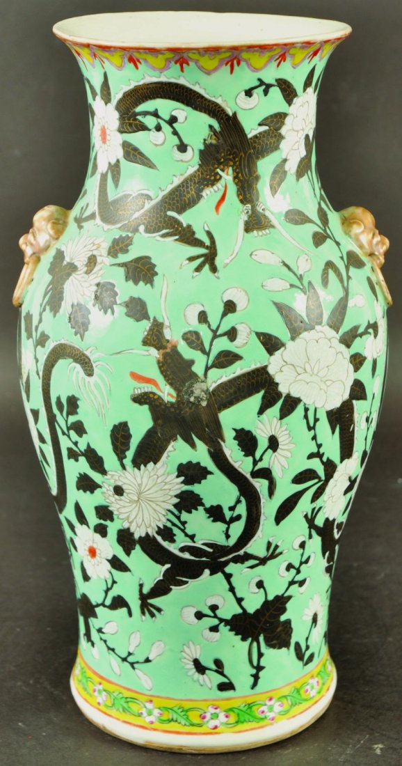 A CHINESE GUANGXU PERIOD DRAGON VASE, painted in the: A CHINESE GUANGXU PERIOD DRAGON VASE, painted in the Empress Dowager style with dragons in black and flowerheads in white reserved on a turquoise ground, 13.9in high. £200-300