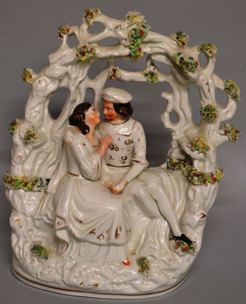 A STAFFORDSHIRE BOUGH GROUP “YOUNG LOVERS”. 10ins: A STAFFORDSHIRE BOUGH GROUP “YOUNG LOVERS”. 10ins high.