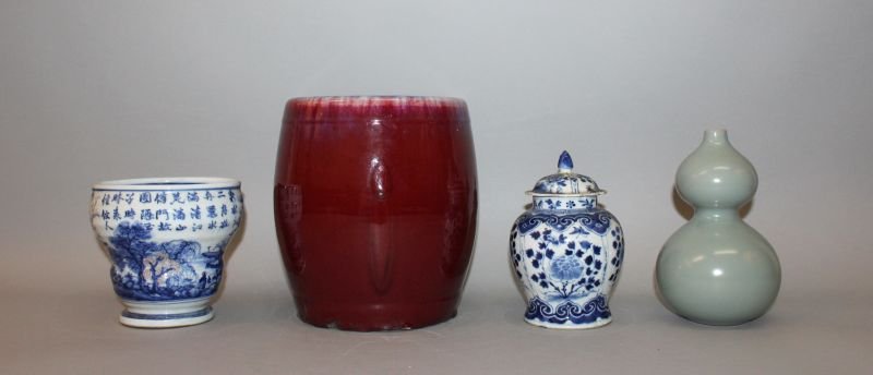 A CHINESE FLAMBE GLAZED PORCELAIN BARREL-FORM JAR, the (1 of 4)