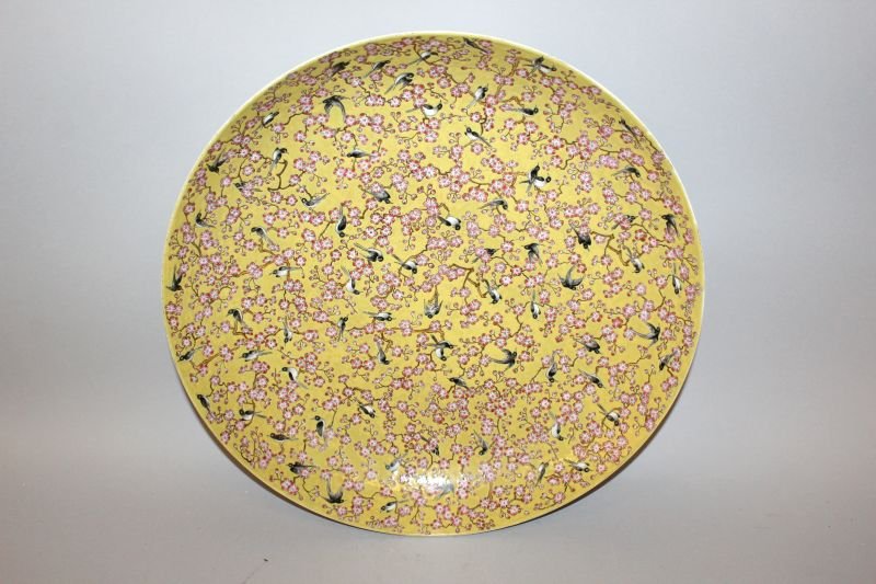 A LARGE CHINESE YELLOW-GROUND PORCELAIN DISH, the (1 of 4)