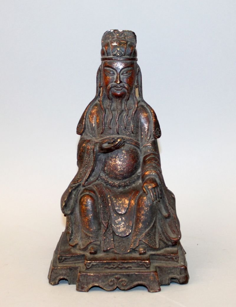 A CHINESE GILT BRONZE FIGURE OF AN EMPEROR, seated in (1 of 3)