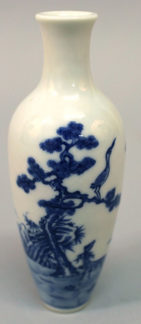 A SMALL CHINESE BLUE & WHITE PORCELAIN VASE, finely: A SMALL CHINESE BLUE & WHITE PORCELAIN VASE, finely decorated with various animals in a continuous fenced landscape scene, the base with a Qianlong seal mark, 5.4in high.