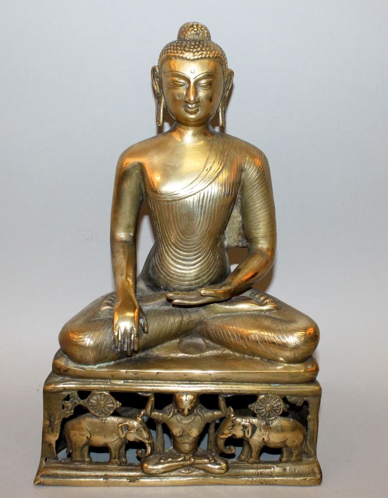 A SOUTH-EAST ASIAN POLISHED BRONZE FIGURE OF BUDDHA, (1 of 3)