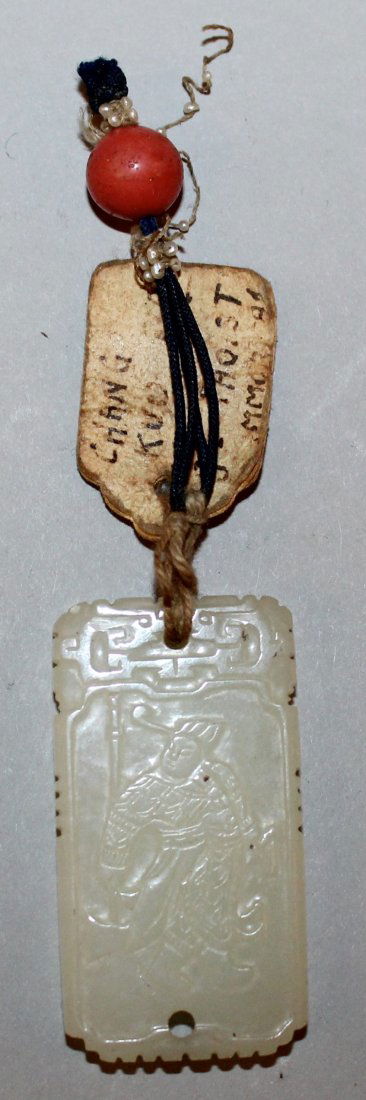 A GOOD QUALITY 19TH CENTURY WHITE JADE PENDANT, of (1 of 3)