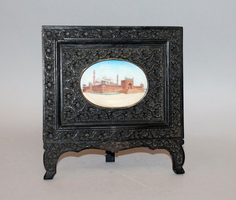 A 19TH CENTURY INDIAN PAINTED MINIATURE ON IVORY OF THE (1 of 2)