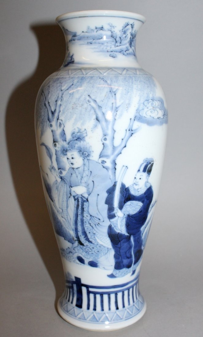 A CHINESE BLUE & WHITE PORCELAIN VASE, decorated to the: A CHINESE BLUE & WHITE PORCELAIN VASE, decorated to the sides with a scene of court officials in a garden setting, 10.4in high. £150-250.