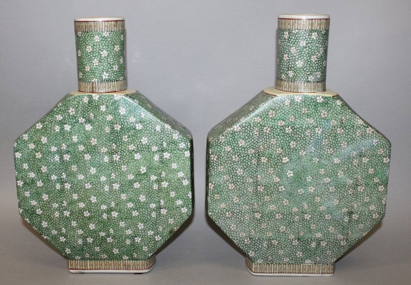 AN UNUSUAL LARGE PAIR OF CHINESE FAMILLE VERTE: AN UNUSUAL LARGE PAIR OF CHINESE FAMILLE VERTE PORCELAIN FLASKS, each with a cylindrical neck and flattened octagonal body, each painted with prunus blossom reserved in white against a green enamel cr