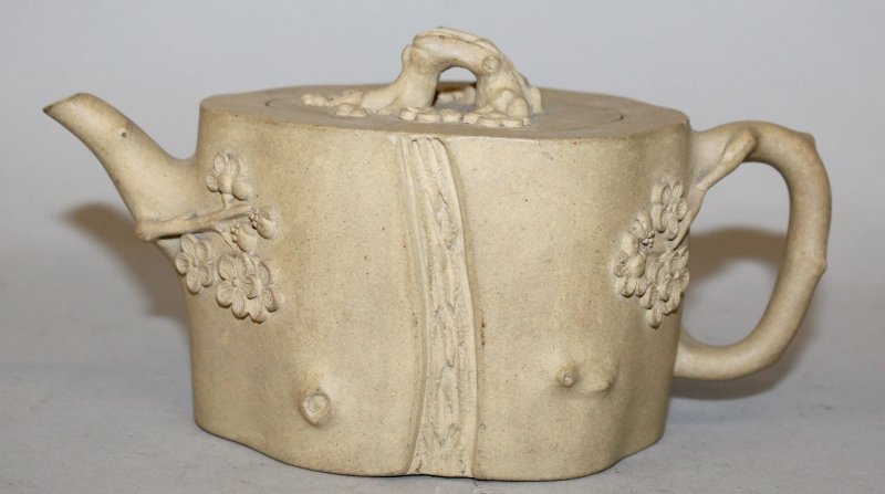 A CHINESE YIXING MOULDED POTTERY TEAPOT & COVER, the (1 of 5)