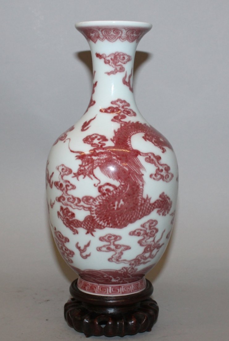 A CHINESE COPPER-RED PORCELAIN DRAGON VASE, together (1 of 3)