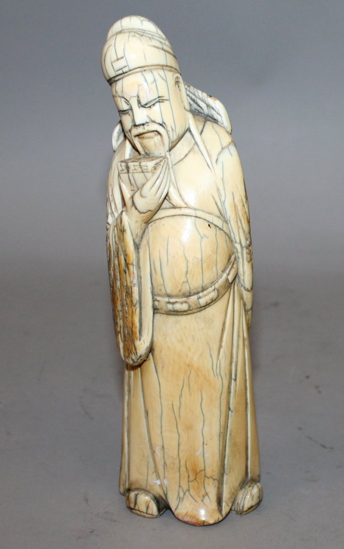 A CHINESE MING STYLE CARVED IVORY FIGURE OF A SAGE, (1 of 4)