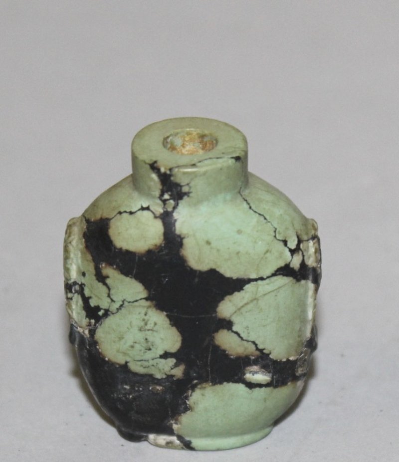 A SMALL CHINESE HARDSTONE SNUFF BOTTLE, with relief (1 of 3)