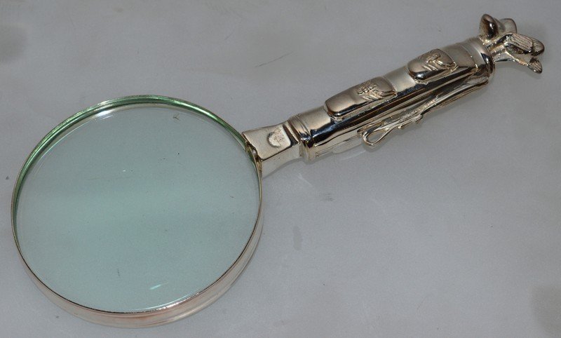 A “GOLFING” PLAYER HANDLE MAGNIFYING GLASS.: A “GOLFING” PLAYER HANDLE MAGNIFYING GLASS.