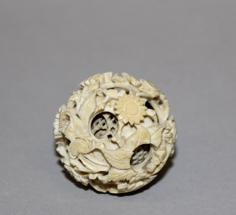 AN EARLY 20TH CENTURY CHINESE CONCENTRIC IVORY BALL, (1 of 3)
