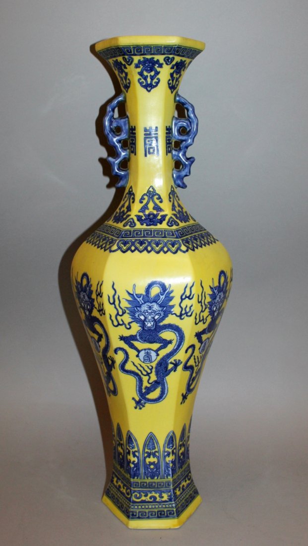 A LARGE CHINESE YELLOW GROUND PORCELAIN VASE, the (1 of 3)