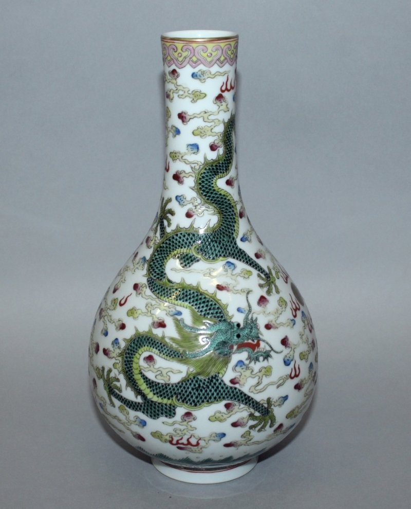 A CHINESE FAMILLE ROSE PORCELAIN DRAGON BOTTLE VASE, (1 of 3)