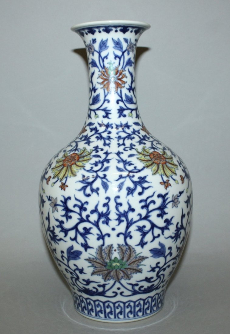 A GOOD QUALITY DOUCAI PORCELAIN VASE, decorated with an (1 of 3)