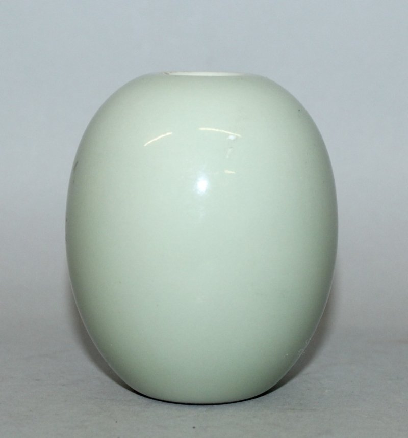 A SMALL CHINESE CELADON PORCELAIN JAR, of oval form (1 of 3)