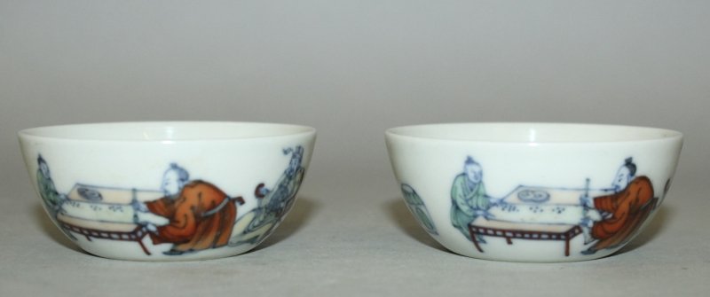 A PAIR OF CHINESE DOUCAI PORCELAIN TEABOWLS, the sides (1 of 3)