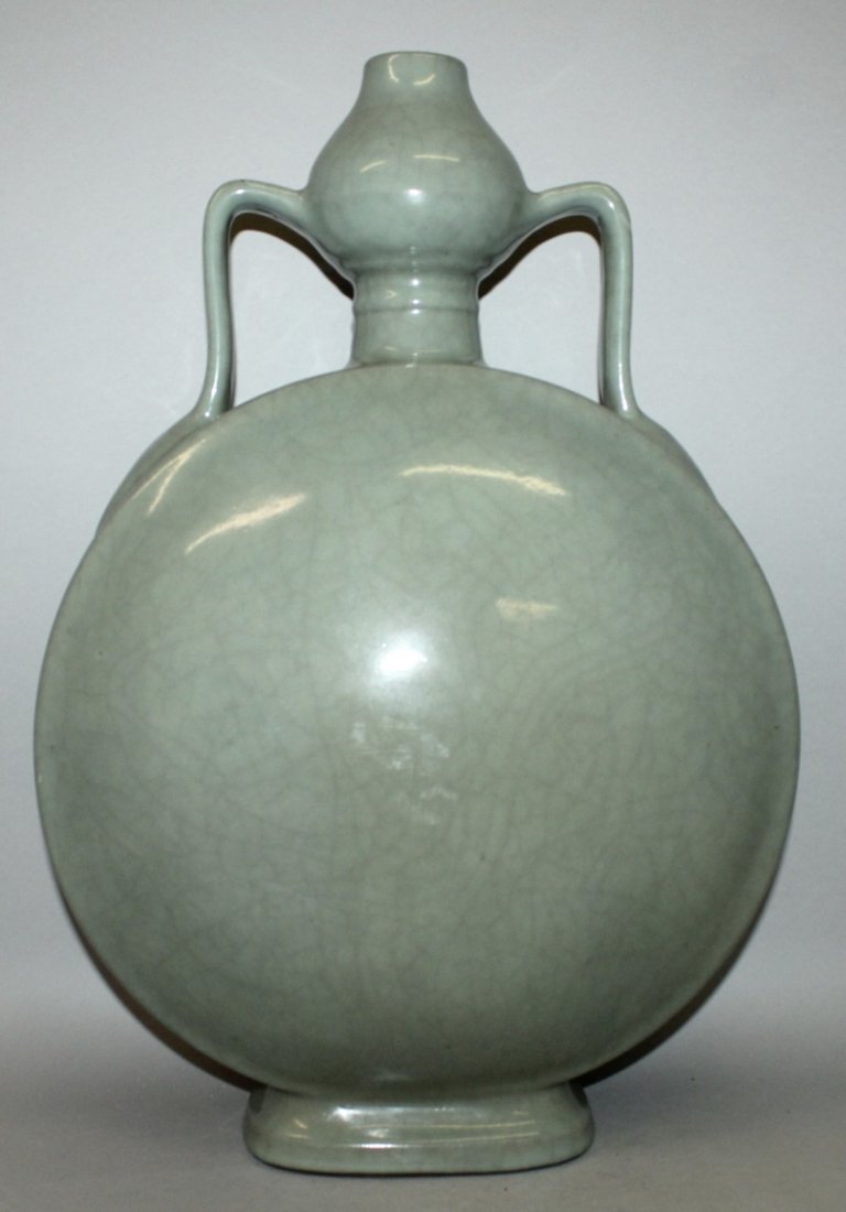A LARGE CHINESE CELADON PORCELAIN MOON FLASK, unusually (1 of 3)